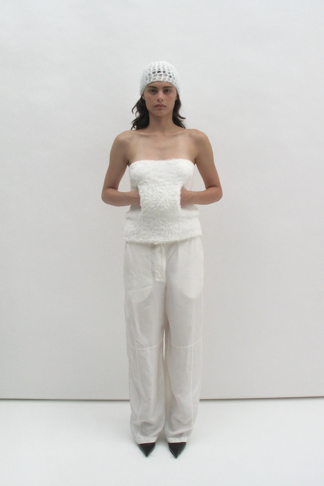 Fluffy white top with a pocket