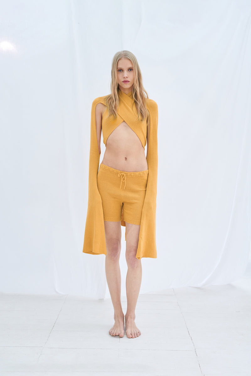 Crossover orange strap top