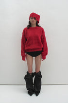 Pull rouge moelleux