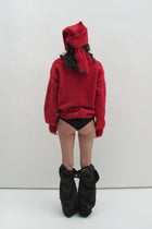 Pull rouge moelleux